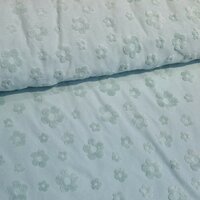 groen badstoftricot met bloemen - KicKenStoffen
