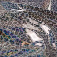 regenjassen stof panterprint met glitters van KicKenStoffen