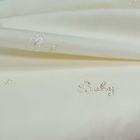 wit (ecru) broderie baby.
