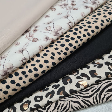 kiezel uni - katoenbol - cheetah kiezelwarm - zwart uni bamboe - kiezel goud luipaard - kiezel kleine zebra tricots