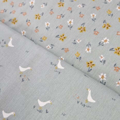 groen kleine ganzen en vrolijke bloemen poplin katoen little goose van KicKenStoffen