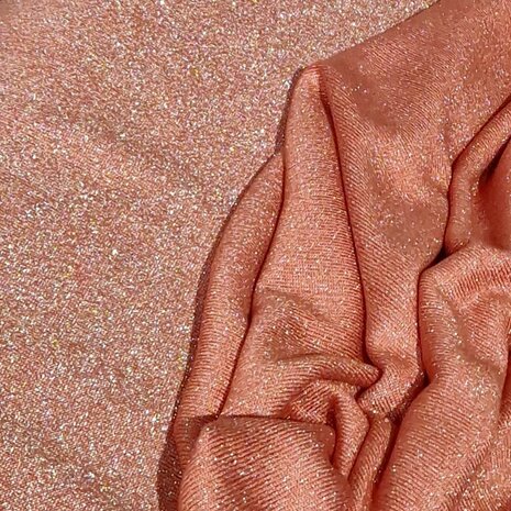 fijn gebreide glitter tricot terracotta tint van KicKenStoffen