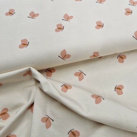 Poppy fabrics vlinders op creme kleurige ondergrond KicKenStoffen