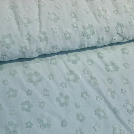 groen badstoftricot met bloemen - KicKenStoffen