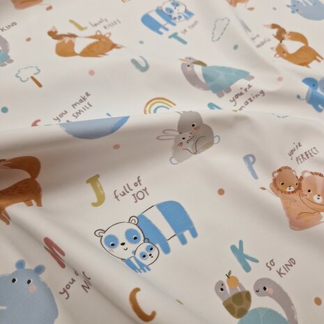 dieren en letters print aqua protect stof - regenjassen stof KicKenStoffen Swessie design