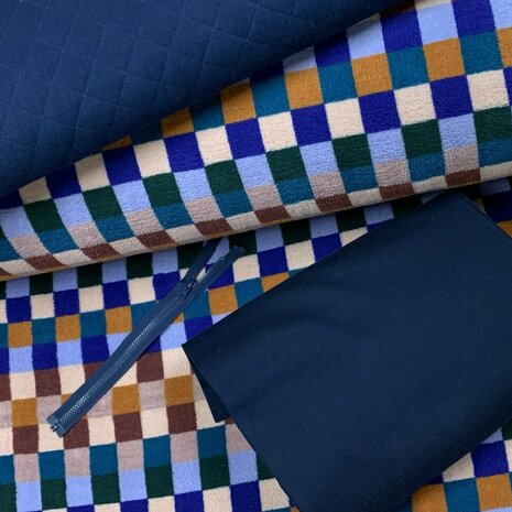 teddy blokken met blauw hydrofiel gevoerd en boordstof blauw en bloktand rits - KicKenStoffen