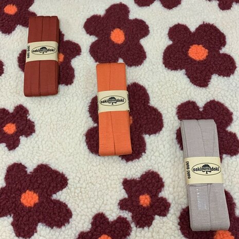 bloem teddy 4220013 met tricot biasband 20100 in terra d. - oranje - beigetaupe  - kickenstoffen