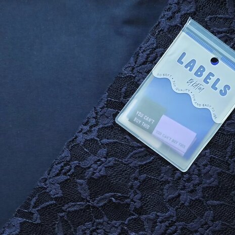 marine blauw kant rekbaar en uni tricot kickenstoffen