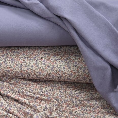lila french terry met bloemetjes tricot