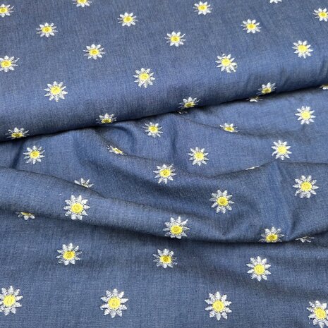 denim met geborduurde daisy flower kickenstoffen