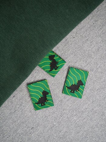 Label Dino kickenstoffen