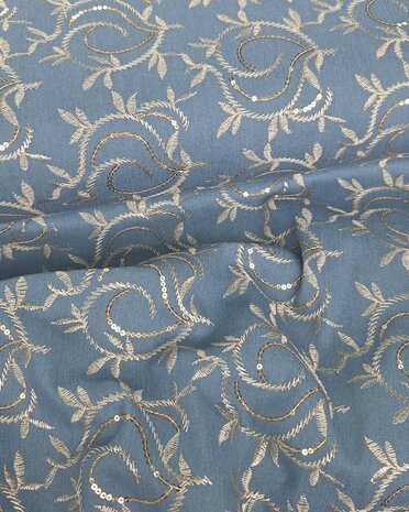 Stretch denim broderie leafs met pailletten  KicKenStoffen