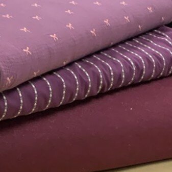 poppy stoffen burgundy en aubergine kickenstoffen