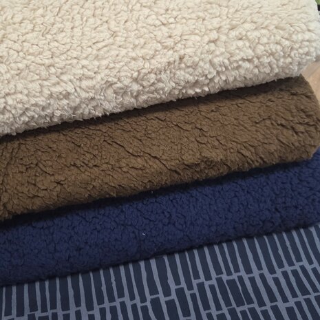 fluffie teddy kiezel bruin en blauw met een katoentje van Poppy