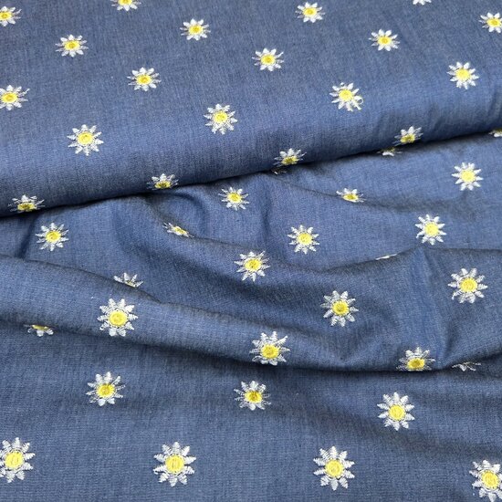 denim met geborduurde daisy flower kickenstoffen