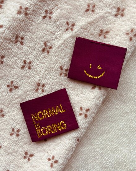 Label Normal is boring bordeaux