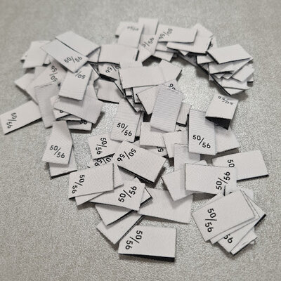 wit (zilver) zwart 50-56 maatlabel 10stuks