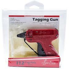 rood schietpistool om (prijs) kaartjes te bevestigen met pins