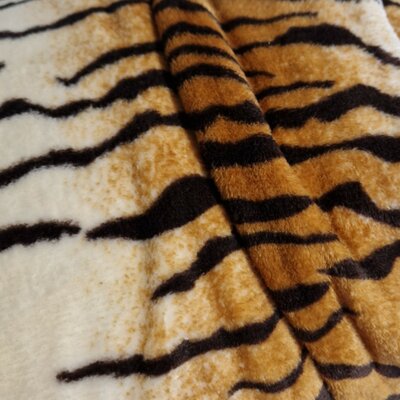 cognac bruin zwart off white tijger wellness fleece (op=op)