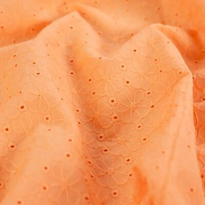 oranje bloemen met schulprand aan 2 zijden broderie katoen