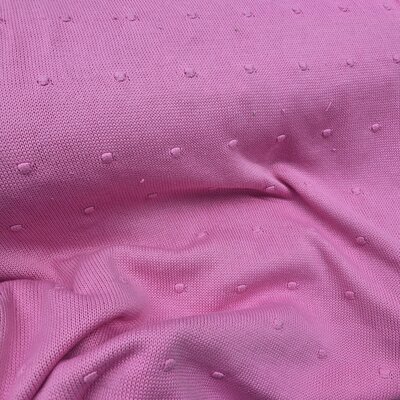 roze (fuchsia) fijn gebreide stof met Toefjes  (op=op)